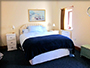 larkrises holidays camping - holiday cottage bedroom showing double bed