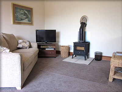 larkrises holidays camping - holiday cottage seating area
