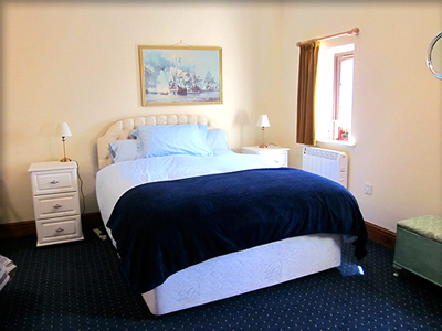 larkrises holidays camping - holiday cottage bedroom showing double bed